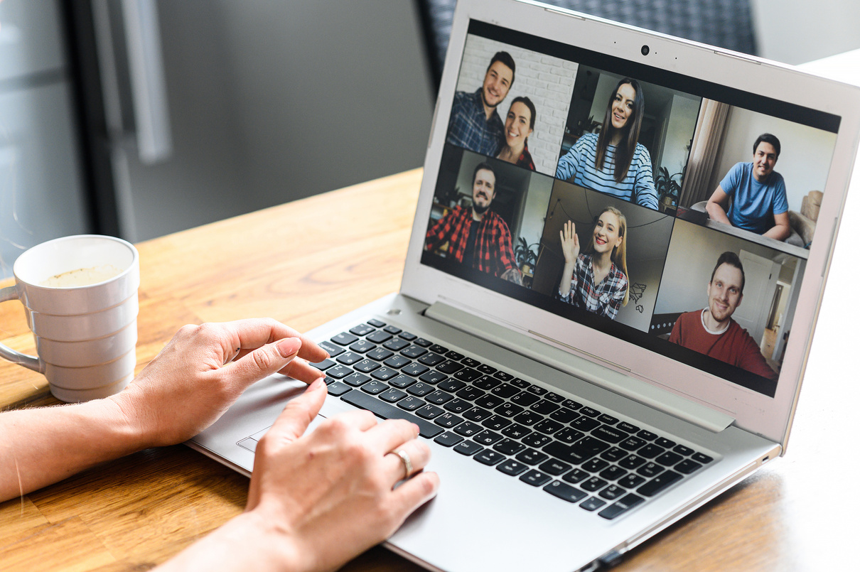 Video meeting on laptop screen, zoom app